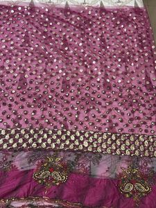 Heavy Purple Stone And Sequin Work Net Saree