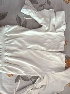 Elegant White Top with Flare Sleeves