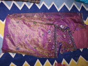Net saree in purple colour havingg 2 shining shade