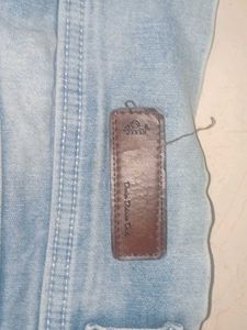 Distressed Denim Jeans with Cutout Detail
