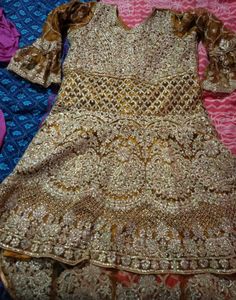 Lehenga And knee length tail Cut top