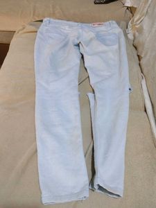 Ripped Knee Light Wash Jeans