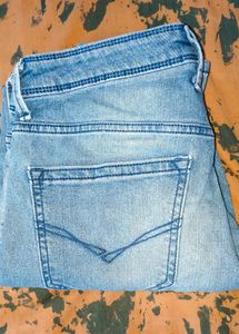 Distressed Denim Jeans