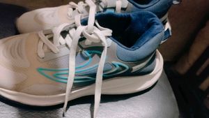 Used Blue Running Shoes