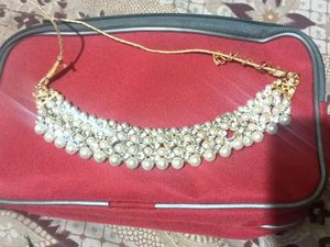 Choker cum necklace with pearls and diamonds