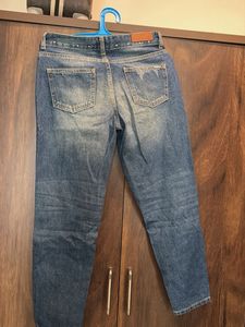 Ripped Blue Denim Jeans