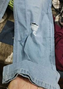 Cosmic Women Straight Fit Mildly Distressed Jeans