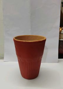 One Palm Size mud Tumbler