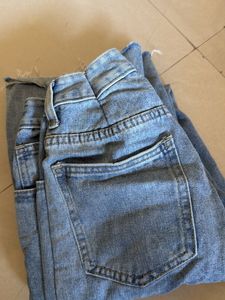 Ripped Wide Leg Denim Jeans