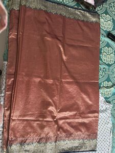 Elegant Bronze Saree with Detailed Border