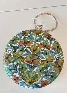 NEW round embroidered look bag