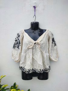 Embroidered Eyelet Off Shoulder Tie Front top