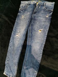 Distressed Denim Jeans