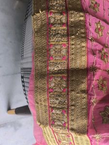 Pink Embroidered unstitched suit piece.