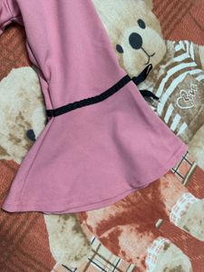 Pink Top With 3D Buttons And Umbrella Sleeves