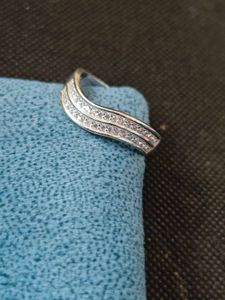 Pure silver ring in white zircon.