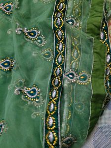 Heavy Party Wear With Stone Work Green Net Saree