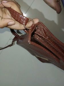 brown handbag crocodile pattern