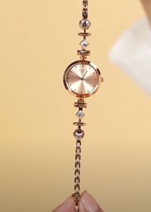 Titan Raga-Elegant Rose Gold Beaded Watch