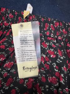 Floral Print Mini Skirt with brand tag