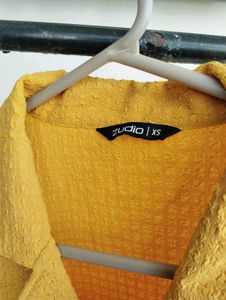 yellow shirt