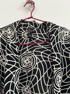 Patterned Black Shrug Top