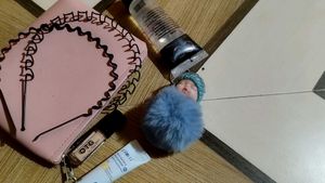 Pink Pouch With Sky Blue Keychain&amp;plum Suncream