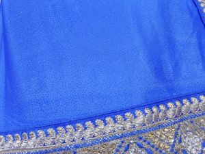 Half net saree with stiched blouse and peticoat
