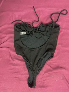 Backless. Bodysuit