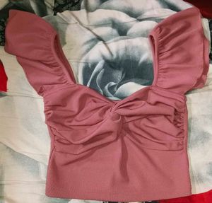 Cropped Vest Ruffle Top In Blush Pink Color