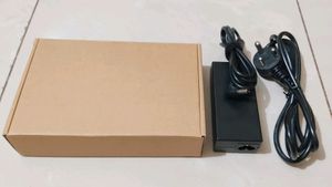New Unused 65W Laptop Power Adapter