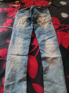 Ripped Blue Denim Jeans