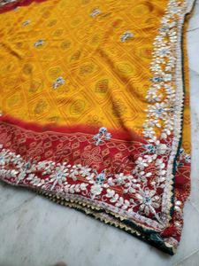 Red and yellow bandhni saree