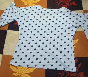 A Grey Top With Polka Dots