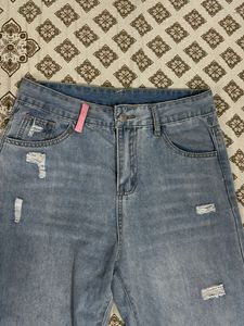 Ripped Wide-Leg Denim Jeans