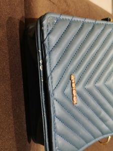 A Sling Bag In Shade Of 💙