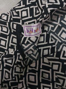 Kibo Brand Chic Geometric Print Romper