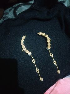 pretty golden color earrings . good looking for party wear outfits.