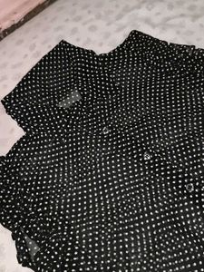 A Black Shirt With White Polka Dot