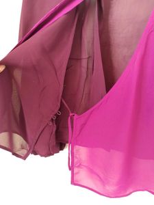 Branded two- tone wrap top.