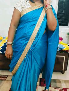 Light Firozi Saree With Golden Border