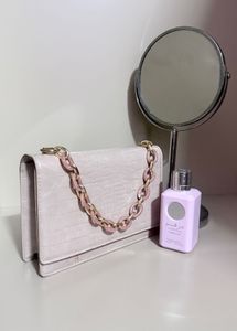 Blush croc embossed shoulder bag with pink chain
