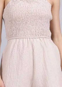 Beige Romper with Ruffle Detail