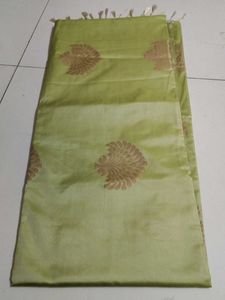 Light green borderless soft silk saree..