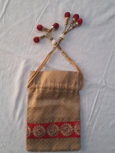 Golden Potli Bag With Red Lace