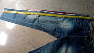 Distressed Jeans with Red and White Stripe