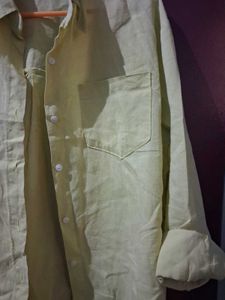 Yellow button up shirt