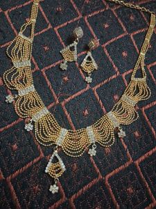 Golden Multi Chain Model Jewellery Set
