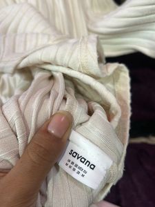 Cream Ribbed Turtleneck Top