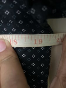 Black With Little Design On The Shirt